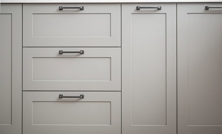 a white cabinet with black handles from a kitchen remodeling in Ocean County, NJ